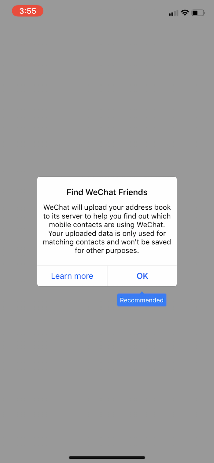 A permission request shown in WeChat on iOS. The permission request reads: 'Find WeChat Friends. WeChat will upload your address book to its server to help you find out which mobile contacts are using WeChat. Your uploaded data is only used for matching contacts and won't be saved for other purposes'. The options for the user is to say 'OK' or 'Learn more'. 'OK' is labelled as 'Recommended'.